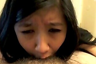 Cute asian girlfriend giving spectacular blowjob