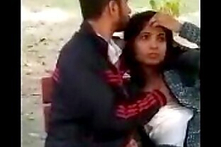 Couple caught in park