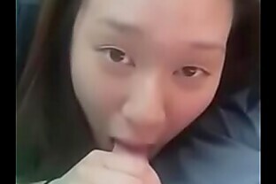 Asian Girl Gives BJ to Nerd While Friend Watches