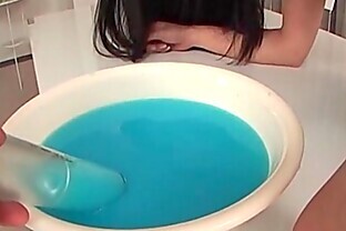 Brunette Asian slut pussy dildoed and ass inserted with toys