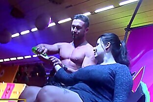 Male stripper on stage with 3 hot girls