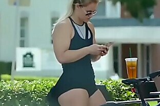 Beautiful muscle girl on bike
