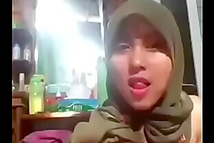 Babysitter in hijab with Cucumber Store