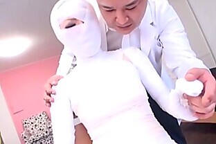 Subtitled bizarre Japanese woman bandaged head to toe