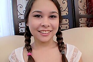 Pigtailed teen Kira Sinn eagerly taking cum facial