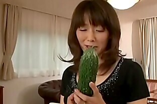 Japanese m. masturbating with a big cucumber